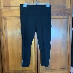 Black lulu lemon legging! Size 8! Calf length. In great condition! Sheer sides